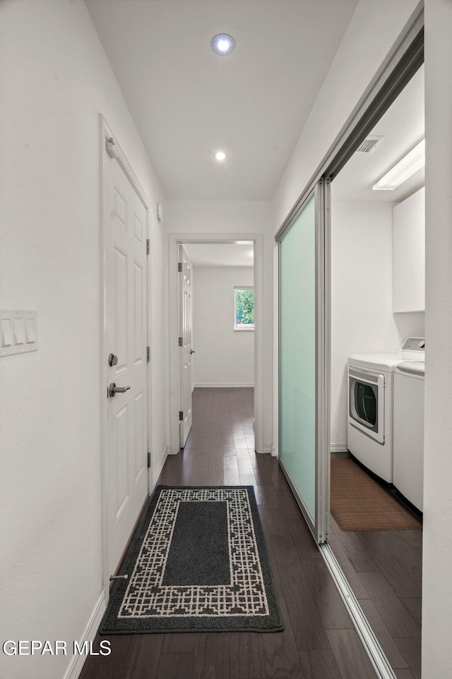10121 Monaco Dr, El Paso, TX 79925 - corridor with washing machine and dryer, recessed lighting, and dark wood-style flooring