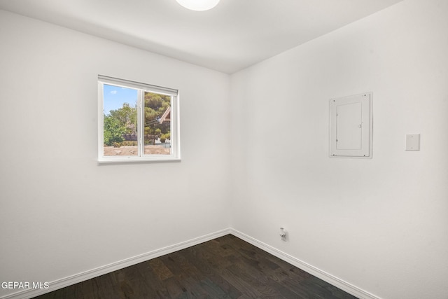 10121 Monaco Dr, El Paso, TX 79925 - spare room with dark wood-style floors and electric panel