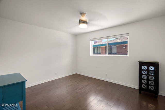 10121 Monaco Dr, El Paso, TX 79925 - empty room featuring ceiling fan and dark wood-type flooring