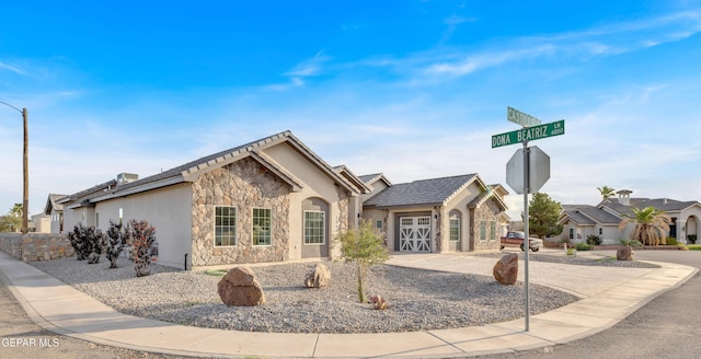 1042 Castillo Ct, El Paso, TX 79932 - view of front of house featuring stone siding and stucco siding