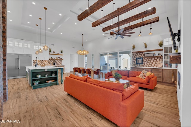 1042 Castillo Ct, El Paso, TX 79932 - living area with a towering ceiling, light wood-type flooring, recessed lighting, ceiling fan, and beam ceiling
