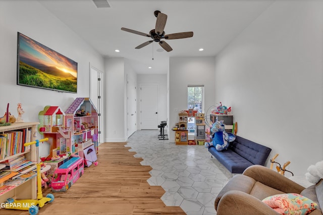 1042 Castillo Ct, El Paso, TX 79932 - rec room with a ceiling fan, recessed lighting, and light wood-style floors