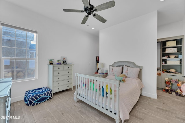 1042 Castillo Ct, El Paso, TX 79932 - bedroom with wood finished floors, multiple windows, recessed lighting, and ceiling fan