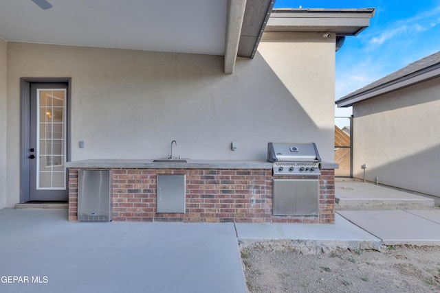 1042 Castillo Ct, El Paso, TX 79932 - view of patio / terrace featuring exterior kitchen and a sink