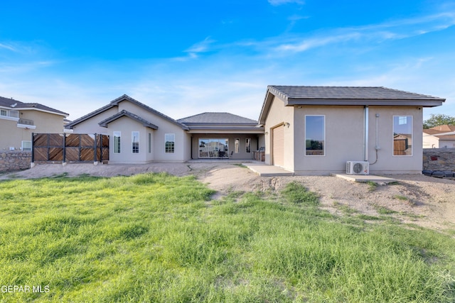 1042 Castillo Ct, El Paso, TX 79932 - rear view of house featuring stucco siding and a patio area