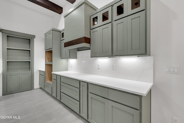 837 Paseo Serra Ct, El Paso, TX 79928 - kitchen with backsplash, beamed ceiling, light wood finished floors, gray cabinets, and light countertops