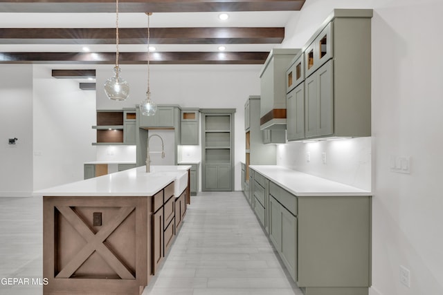 837 Paseo Serra Ct, El Paso, TX 79928 - kitchen featuring beam ceiling, an island with sink, decorative light fixtures, light countertops, and recessed lighting