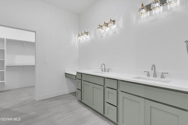 837 Paseo Serra Ct, El Paso, TX 79928 - bathroom with wood finished floors and double vanity