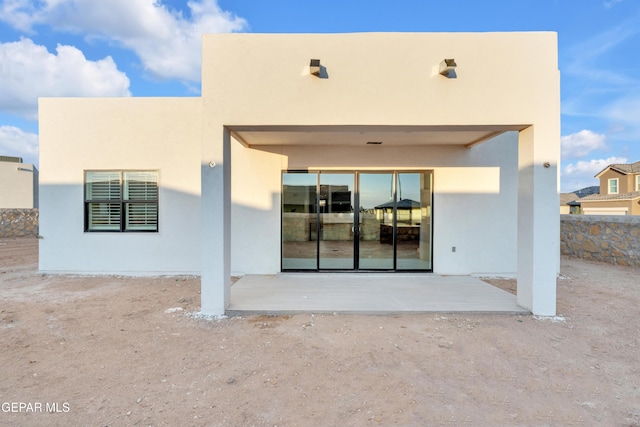 837 Paseo Serra Ct, El Paso, TX 79928 - back of house with a patio and stucco siding