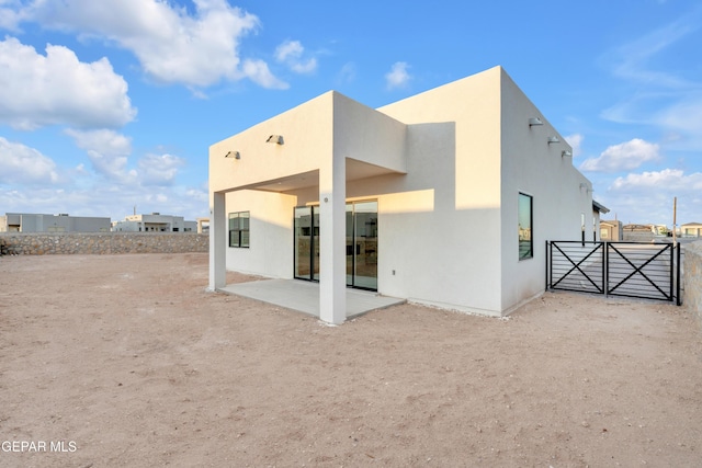 837 Paseo Serra Ct, El Paso, TX 79928 - back of house with a patio and stucco siding