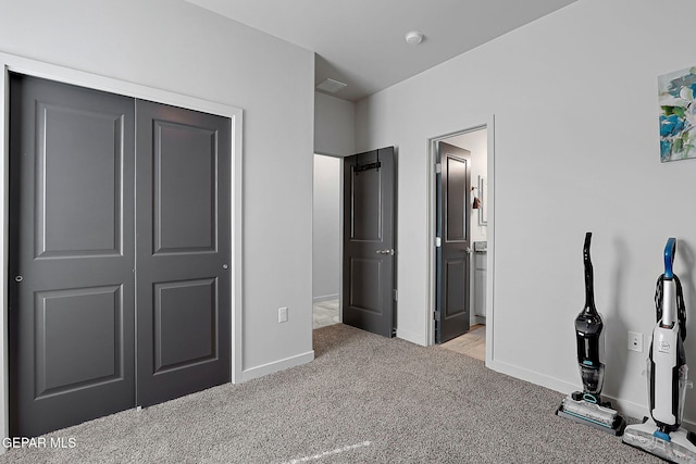 2362 Enchanted Crown Ln, El Paso, TX 79911 - unfurnished bedroom featuring carpet floors, a closet, and connected bathroom
