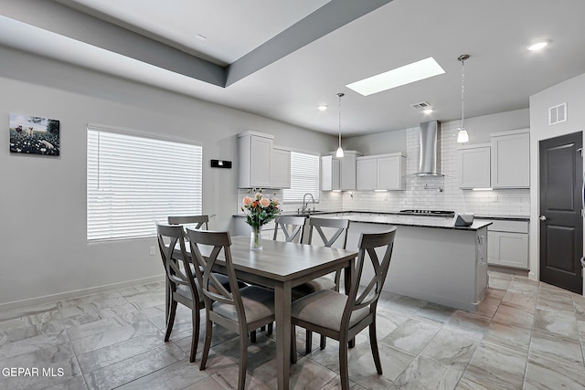 2362 Enchanted Crown Ln, El Paso, TX 79911 - dining room featuring a skylight and recessed lighting