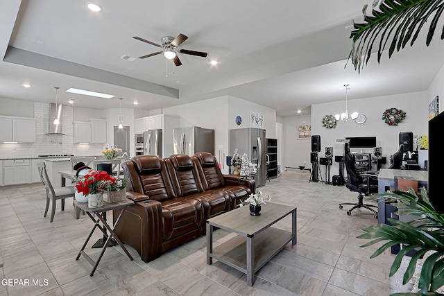 2362 Enchanted Crown Ln, El Paso, TX 79911 - living room with an office area, a ceiling fan, recessed lighting, and a chandelier