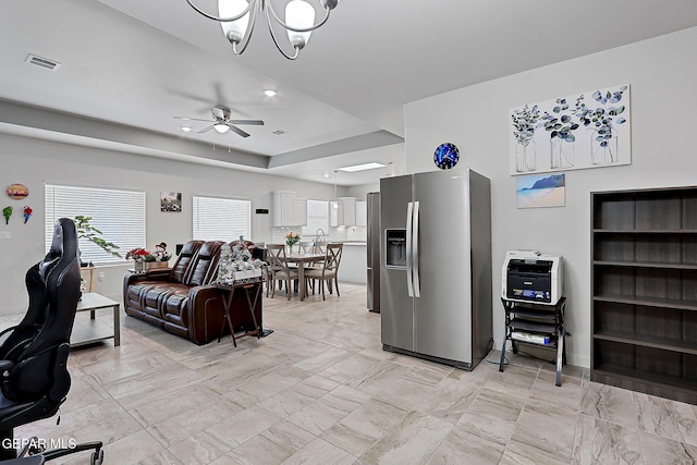 2362 Enchanted Crown Ln, El Paso, TX 79911 - living room with a ceiling fan, a chandelier, light marble finish floors, and recessed lighting
