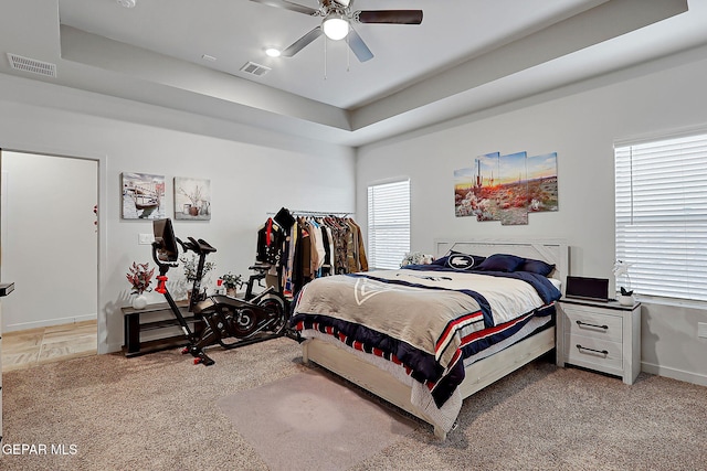 2362 Enchanted Crown Ln, El Paso, TX 79911 - bedroom with a raised ceiling, carpet, and a ceiling fan