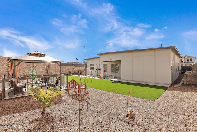 2362 Enchanted Crown Ln, El Paso, TX 79911 - rear view of property featuring a patio, a gazebo, and board and batten siding