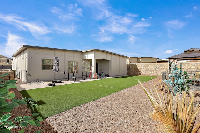 2362 Enchanted Crown Ln, El Paso, TX 79911 - back of house with a patio, a gazebo, and a fenced backyard