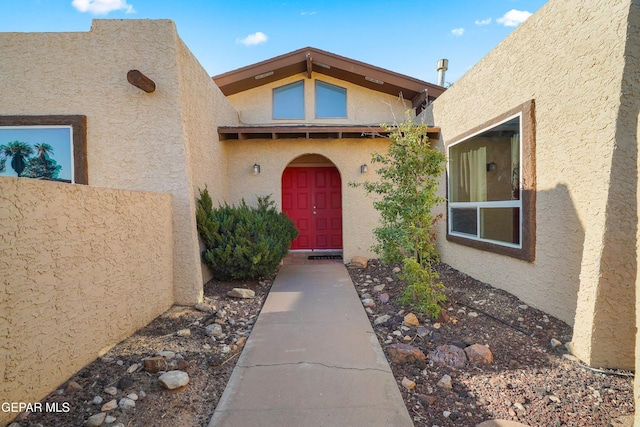 6604 Camino Fuente Dr, El Paso, TX 79912 - doorway to property featuring stucco siding