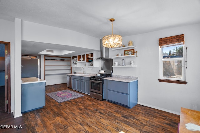 6604 Camino Fuente Dr, El Paso, TX 79912 - kitchen featuring stainless steel appliances, open shelves, dark wood-type flooring, a chandelier, and light countertops