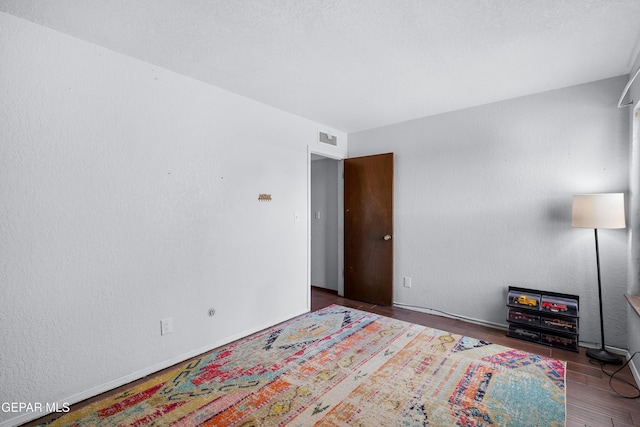 6604 Camino Fuente Dr, El Paso, TX 79912 - bedroom with wood finished floors