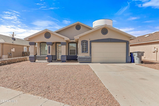 13344 Jonathan Elias Ct, El Paso, TX 79938 - ranch-style home with driveway, an attached garage, and stucco siding