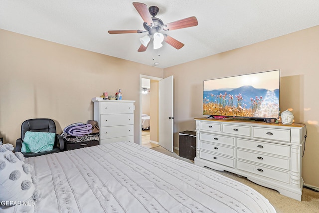 13344 Jonathan Elias Ct, El Paso, TX 79938 - bedroom featuring light carpet and ceiling fan