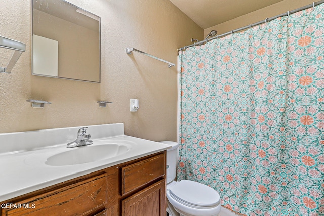 13344 Jonathan Elias Ct, El Paso, TX 79938 - bathroom with vanity, a shower with curtain, and a textured wall