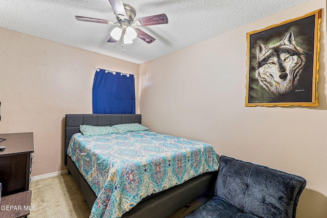 13344 Jonathan Elias Ct, El Paso, TX 79938 - carpeted bedroom featuring a textured ceiling and ceiling fan