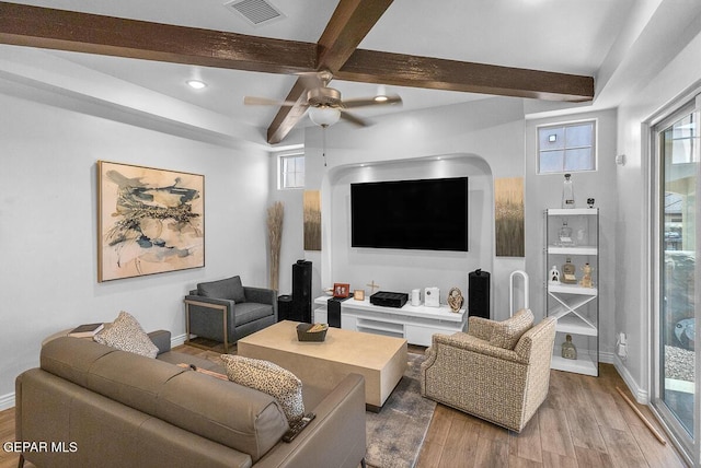 991 Hull St, El Paso, TX 79928 - living area with beamed ceiling, wood finished floors, ceiling fan, recessed lighting, and healthy amount of natural light