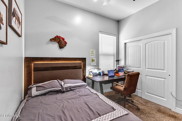 991 Hull St, El Paso, TX 79928 - carpeted bedroom with a closet, an office area, and a ceiling fan
