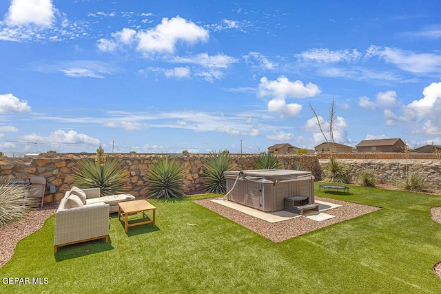 991 Hull St, El Paso, TX 79928 - fenced backyard with a hot tub and a patio