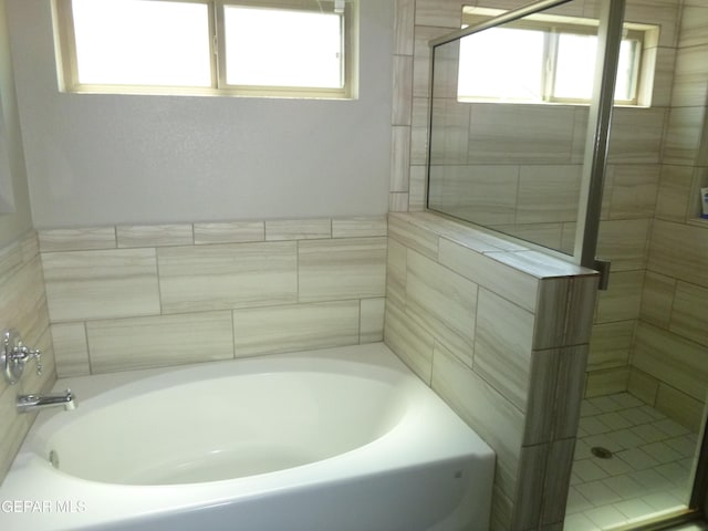 929 Pecos River Dr, El Paso, TX 79932 - full bathroom with a bath and a stall shower