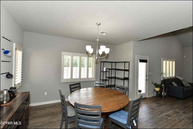 929 Pecos River Dr, El Paso, TX 79932 - dining room featuring a chandelier, dark wood-style floors, and healthy amount of natural light