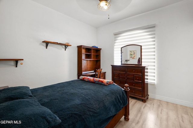 12247 Chisholm Pass Dr, El Paso, TX 79936 - bedroom with light wood-type flooring and a ceiling fan