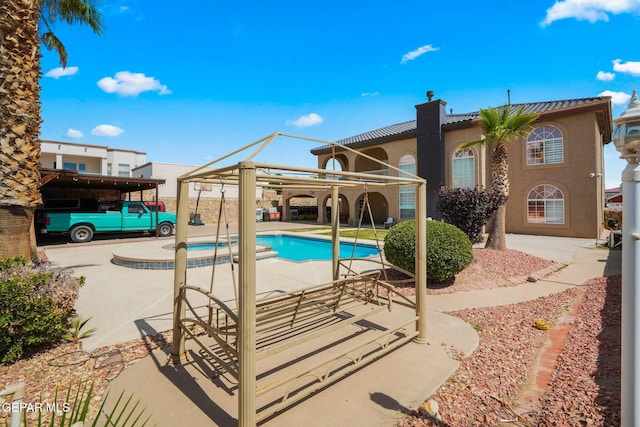 12247 Chisholm Pass Dr, El Paso, TX 79936 - view of swimming pool featuring a patio area, a pool with connected hot tub, and a gazebo