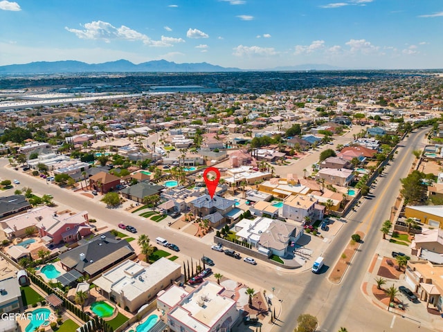 12247 Chisholm Pass Dr, El Paso, TX 79936 - aerial view of residential area featuring a mountain backdrop