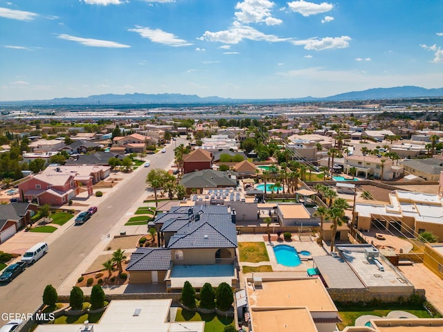 12247 Chisholm Pass Dr, El Paso, TX 79936 - aerial view of residential area featuring a pool and a mountainous background