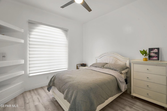 12247 Chisholm Pass Dr, El Paso, TX 79936 - bedroom with wood finished floors and ceiling fan