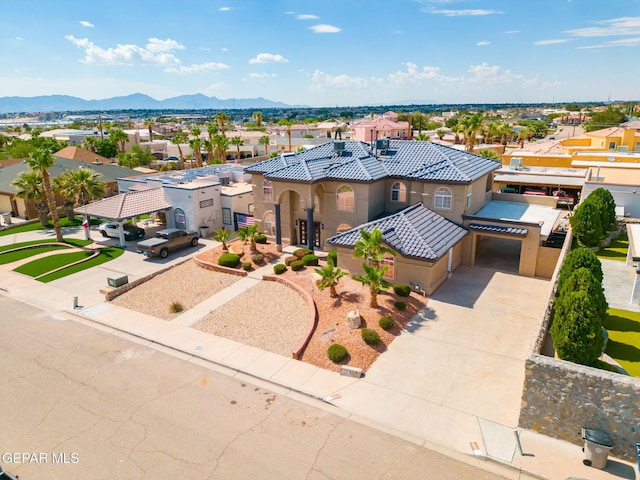 12247 Chisholm Pass Dr, El Paso, TX 79936 - aerial perspective of suburban area with a mountainous background