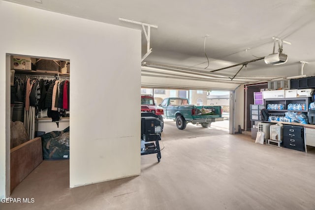 12247 Chisholm Pass Dr, El Paso, TX 79936 - garage featuring a garage door opener