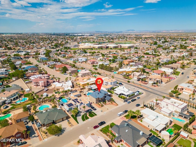 12247 Chisholm Pass Dr, El Paso, TX 79936 - aerial view of property's location with mountains and nearby suburban area