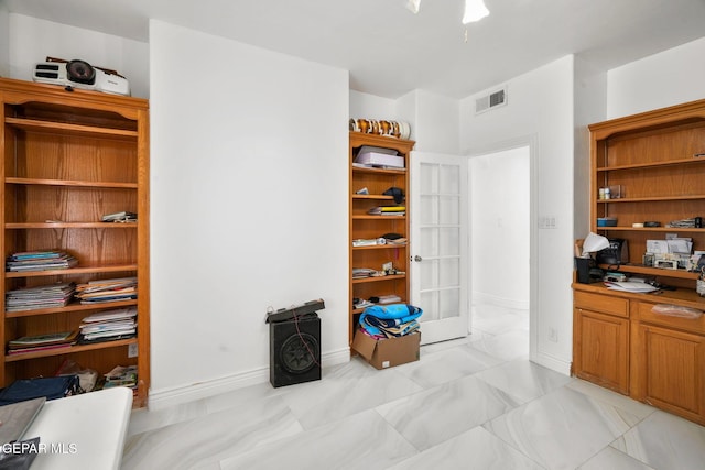 12247 Chisholm Pass Dr, El Paso, TX 79936 - office with light marble finish flooring and baseboards