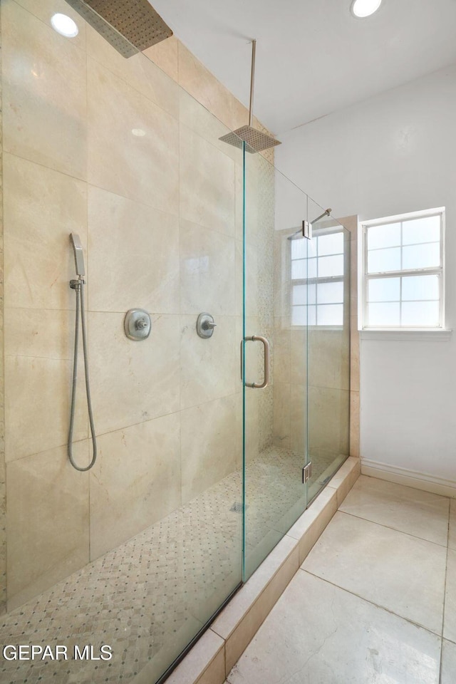 12247 Chisholm Pass Dr, El Paso, TX 79936 - bathroom featuring a stall shower and tile patterned flooring