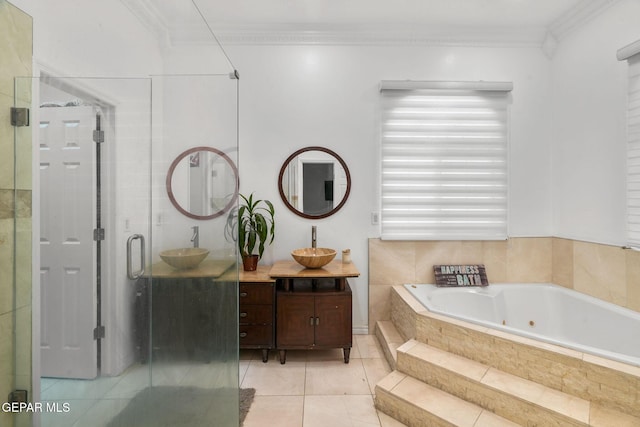 12247 Chisholm Pass Dr, El Paso, TX 79936 - bathroom featuring vanity, a whirlpool tub, a stall shower, crown molding, and tile patterned floors