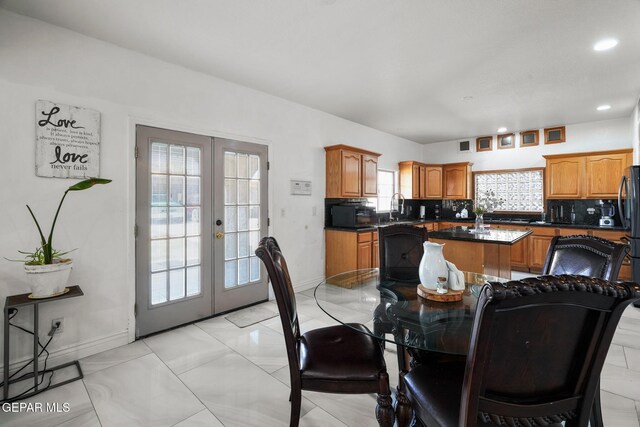 12247 Chisholm Pass Dr, El Paso, TX 79936 - dining area featuring french doors, recessed lighting, and light marble finish floors