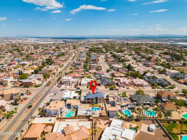 12247 Chisholm Pass Dr, El Paso, TX 79936 - aerial perspective of suburban area with a pool