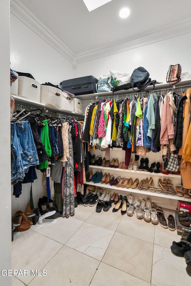 12247 Chisholm Pass Dr, El Paso, TX 79936 - walk in closet featuring tile patterned flooring
