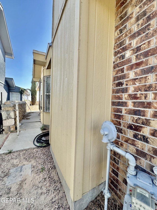 12036 Valley Quail Dr, El Paso, TX 79936 - view of side of property with brick siding
