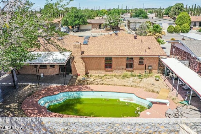 1944 Ratner Cir, El Paso, TX 79936 - swimming pool featuring a diving board
