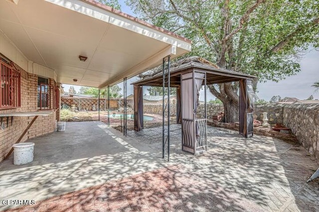 1944 Ratner Cir, El Paso, TX 79936 - fenced backyard featuring a gazebo and a patio area